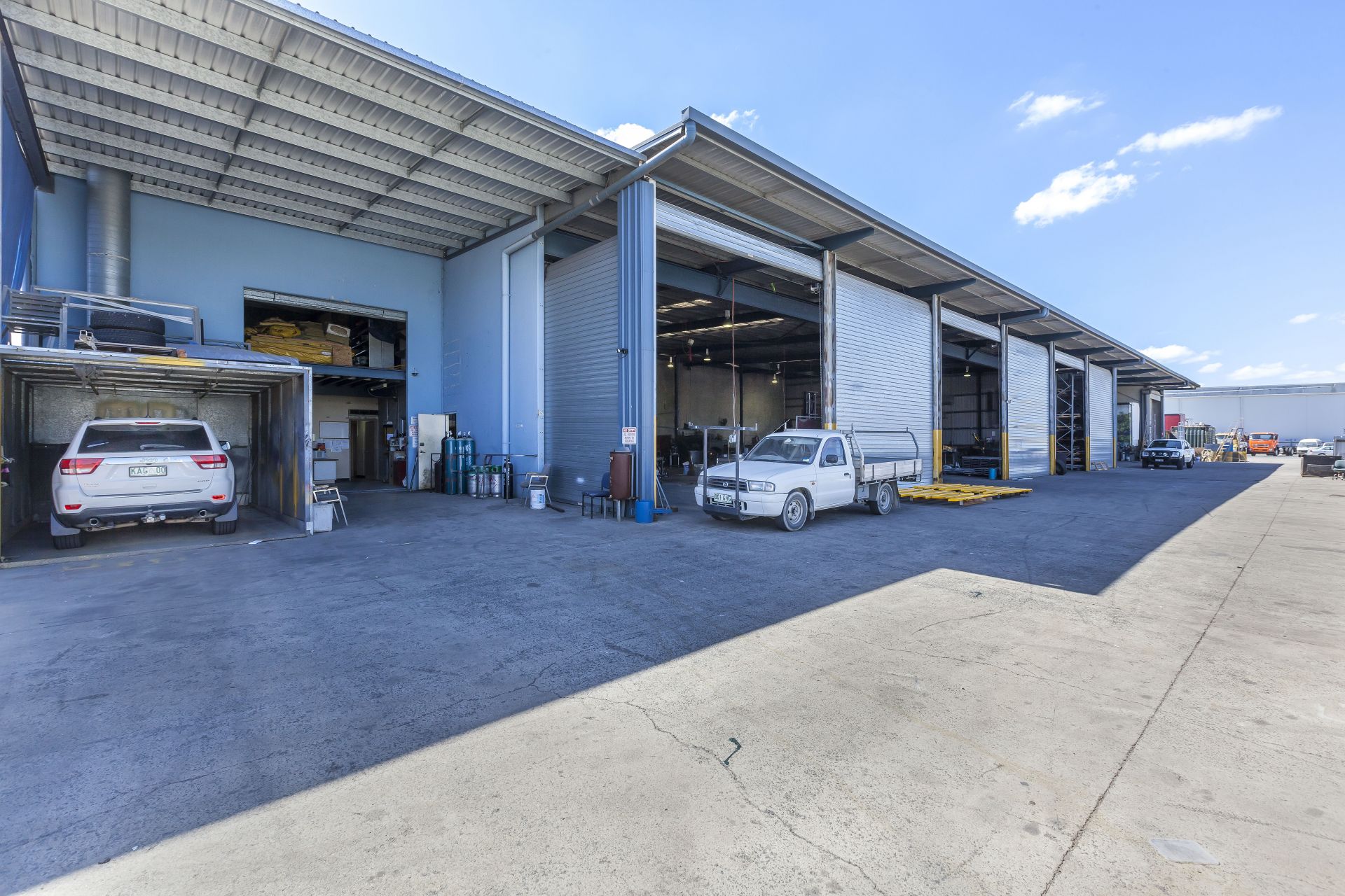 Highly functional warehouse with multiple roller doors